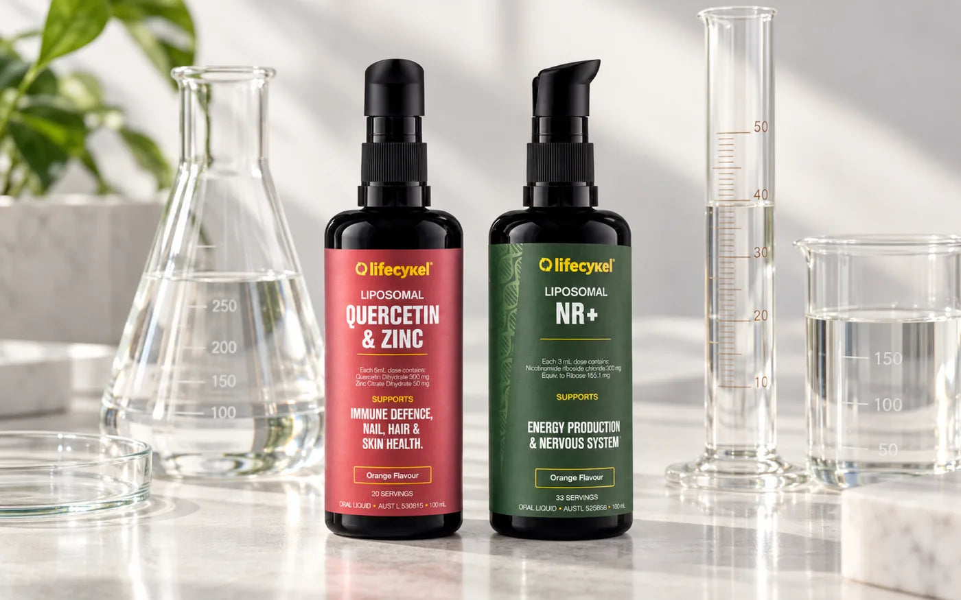 Lifecykel Liposomal NR+ and Liposomal Quercetin & Zinc bottles on a laboratory bench with glassware